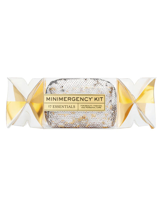A small colorfull and sparkley rectangular pouch enclosed in a clear plastic twist box. Inside contains 17 essentialls for beauty, fashion and personal care.